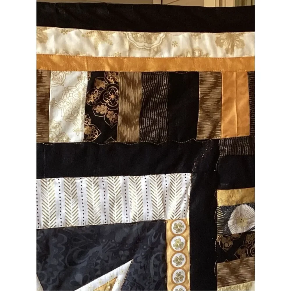 NWT. Gold and Black Star Lap Quilt